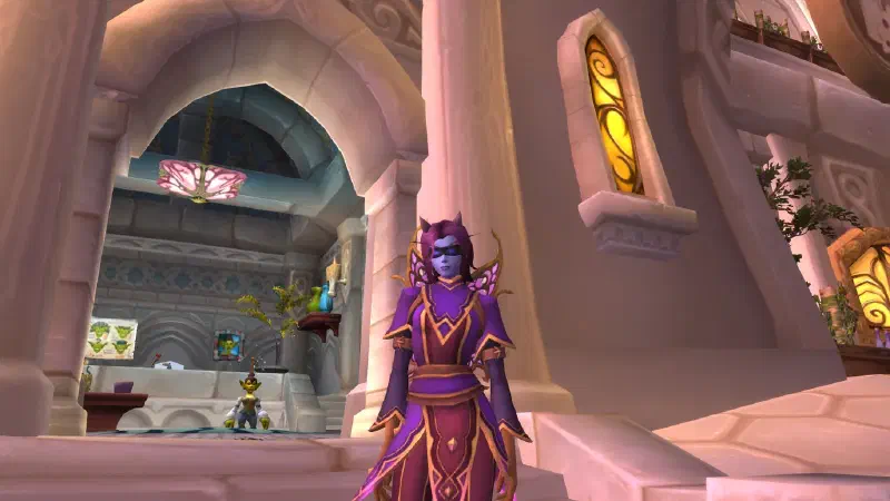 Ecliseese outside a Dalaran shop doorway, blindfolded, in her violet-and-magenta robe